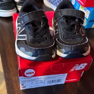 New Balance Kids' Black and White Sneakers
